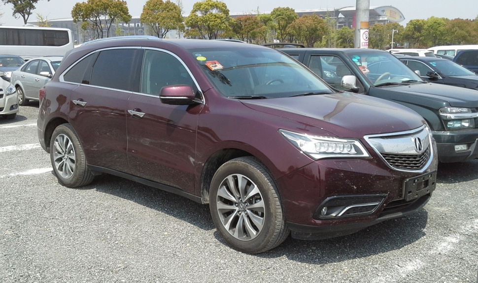 SUV with jewel-eye LED headlights, chrome grille, and alloy wheels