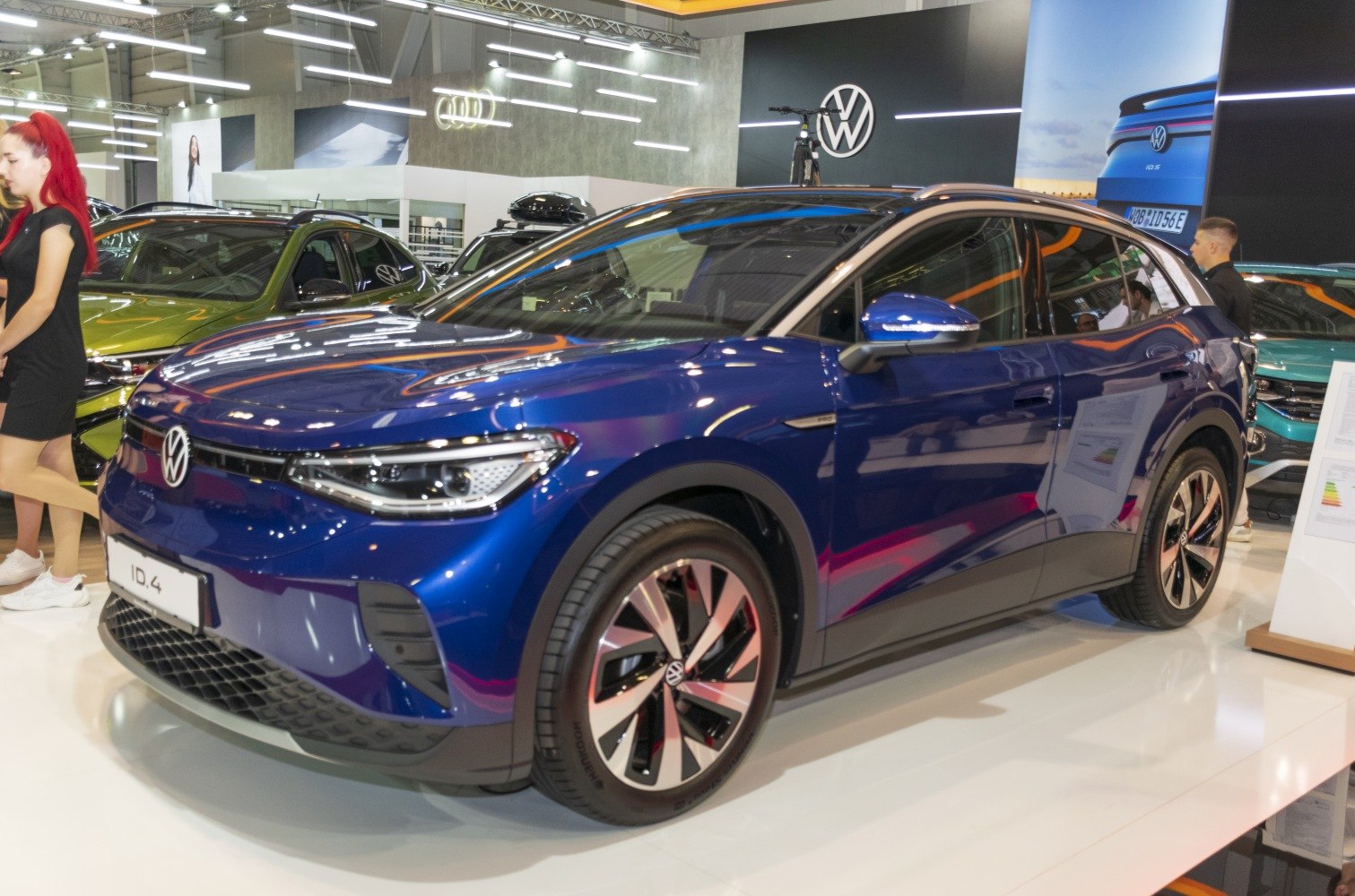 Blue electric SUV front and side view with LED headlights and alloy wheels