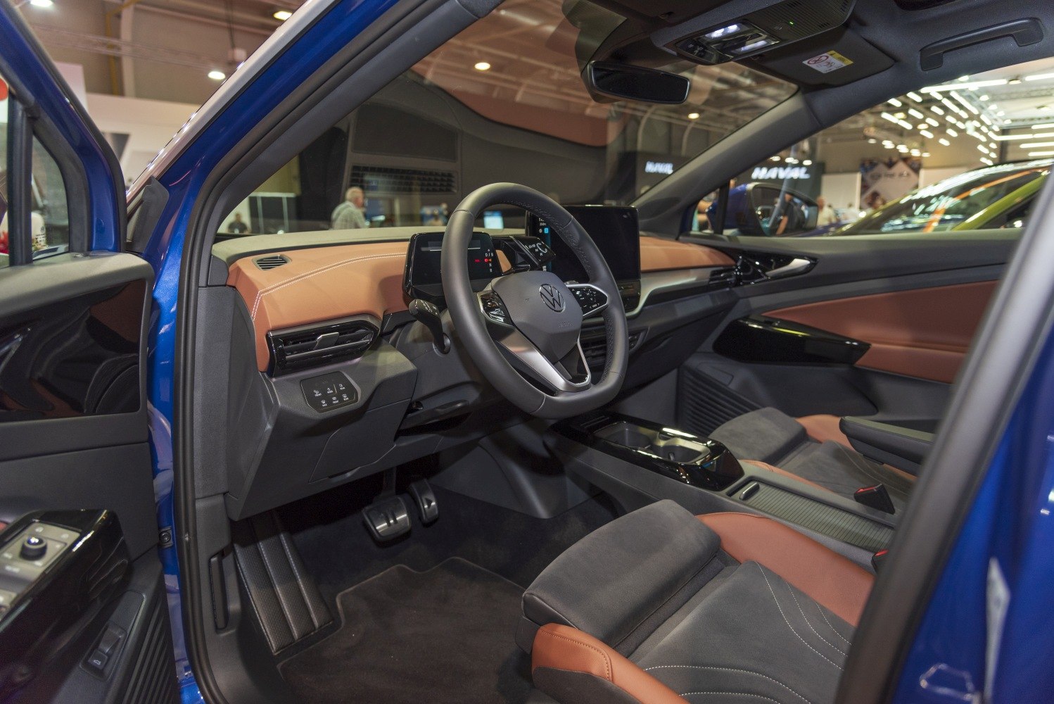 Modern dashboard and digital instrument cluster with ergonomic steering wheel.