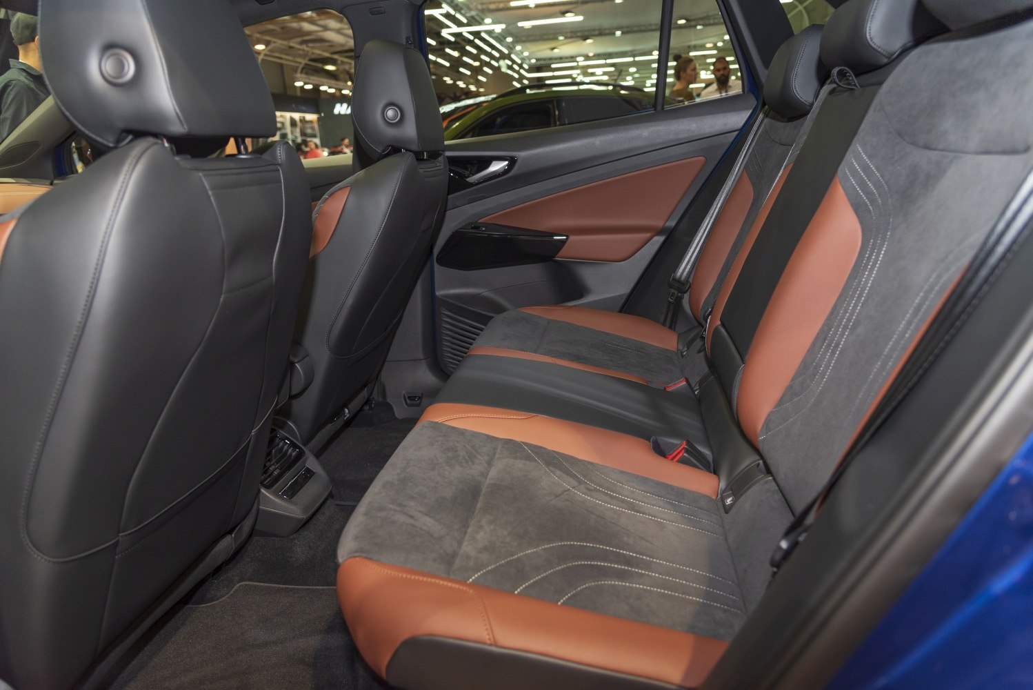 Luxury rear seat with leather and suede upholstery and detailed stitching