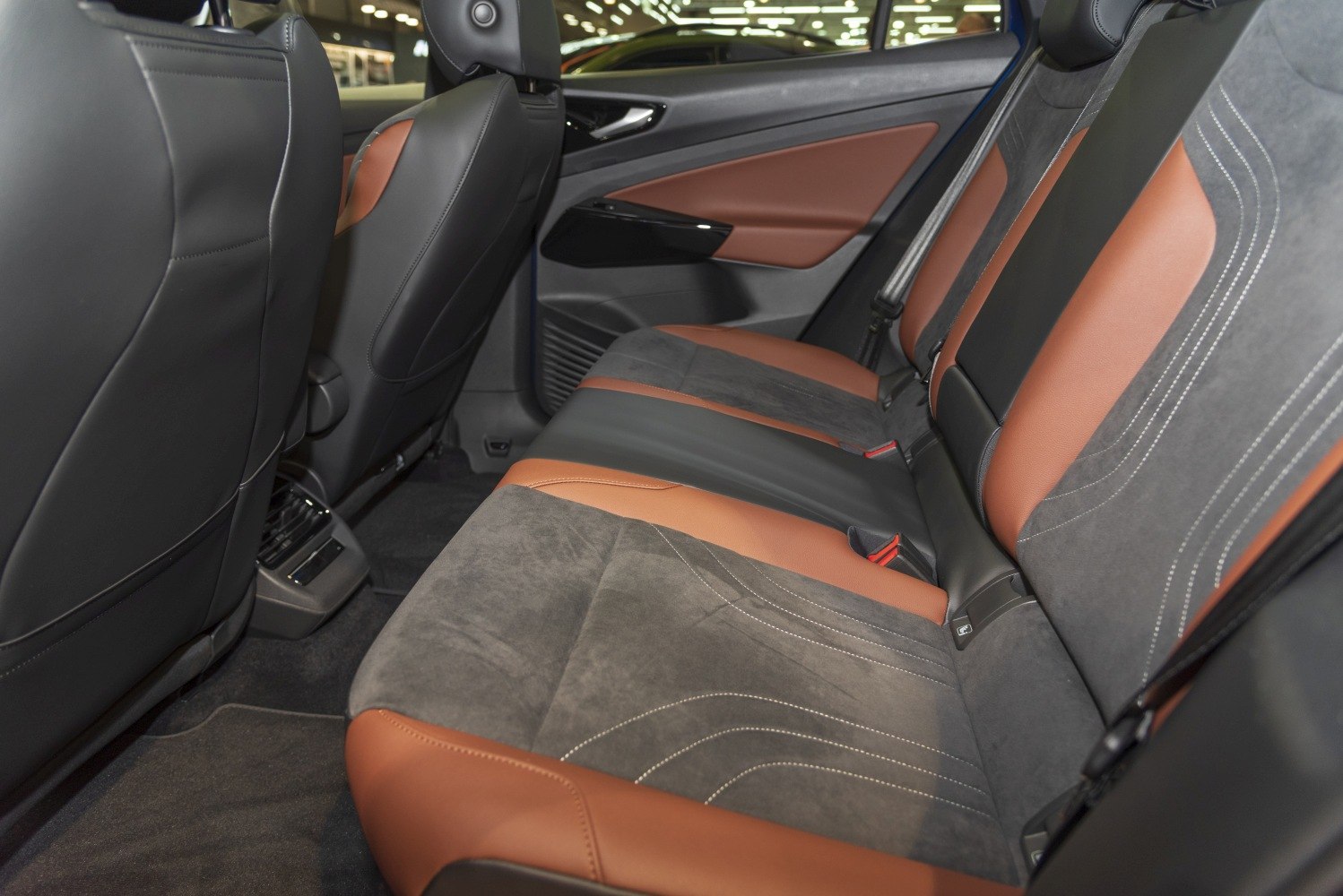 Rear seat with two-tone upholstery and modern stitching design