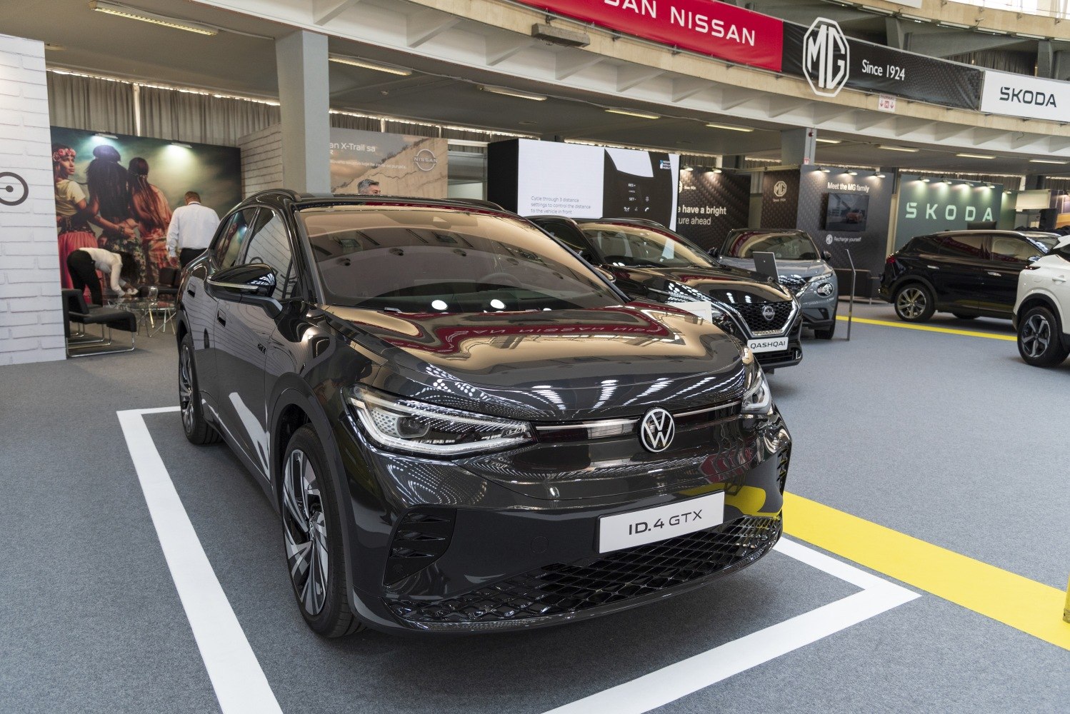 Front view with LED headlights and grille of electric SUV