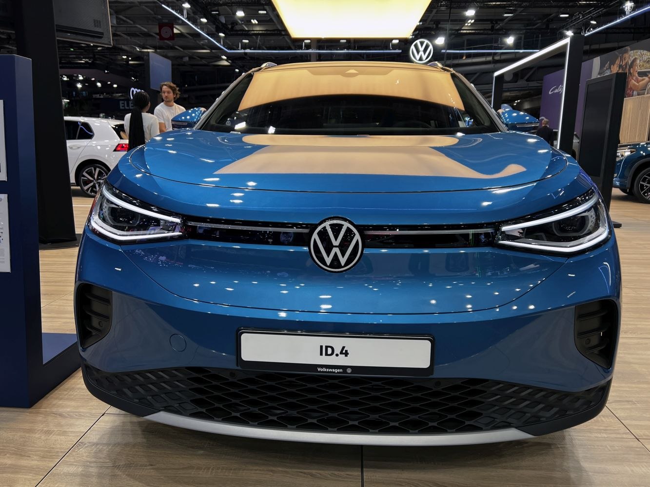 Front view of electric SUV with LED headlights and VW logo