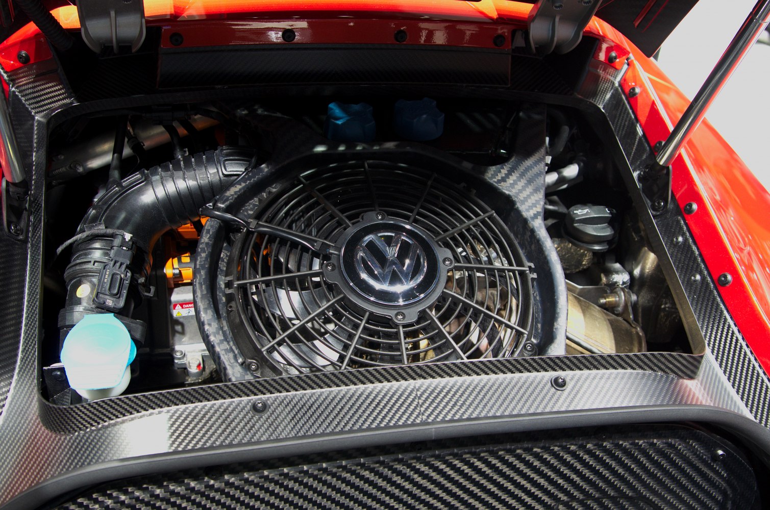 Carbon fiber framed engine bay with VW cooling fan emblem