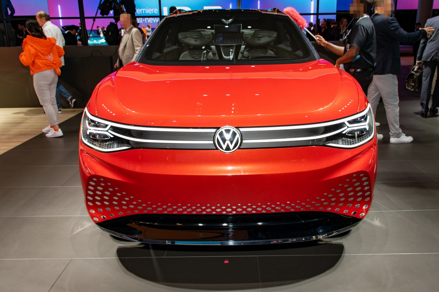 Front view with LED headlights and futuristic grille design