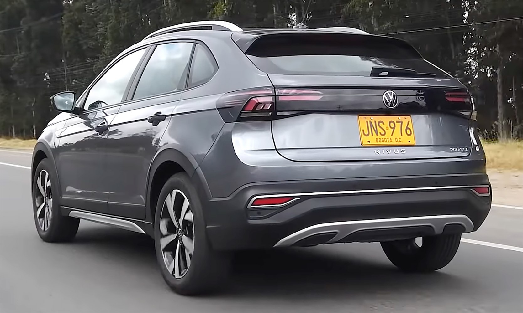 Rear view of a crossover with LED tail lights and alloy wheels.