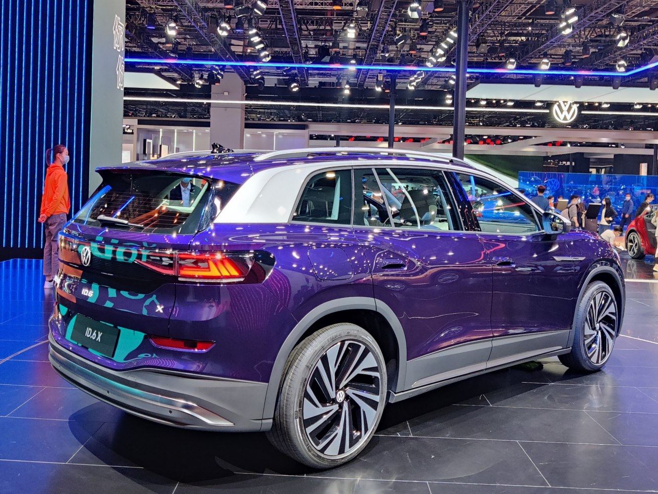 Rear and side view of an electric SUV with sleek taillights and alloy wheels