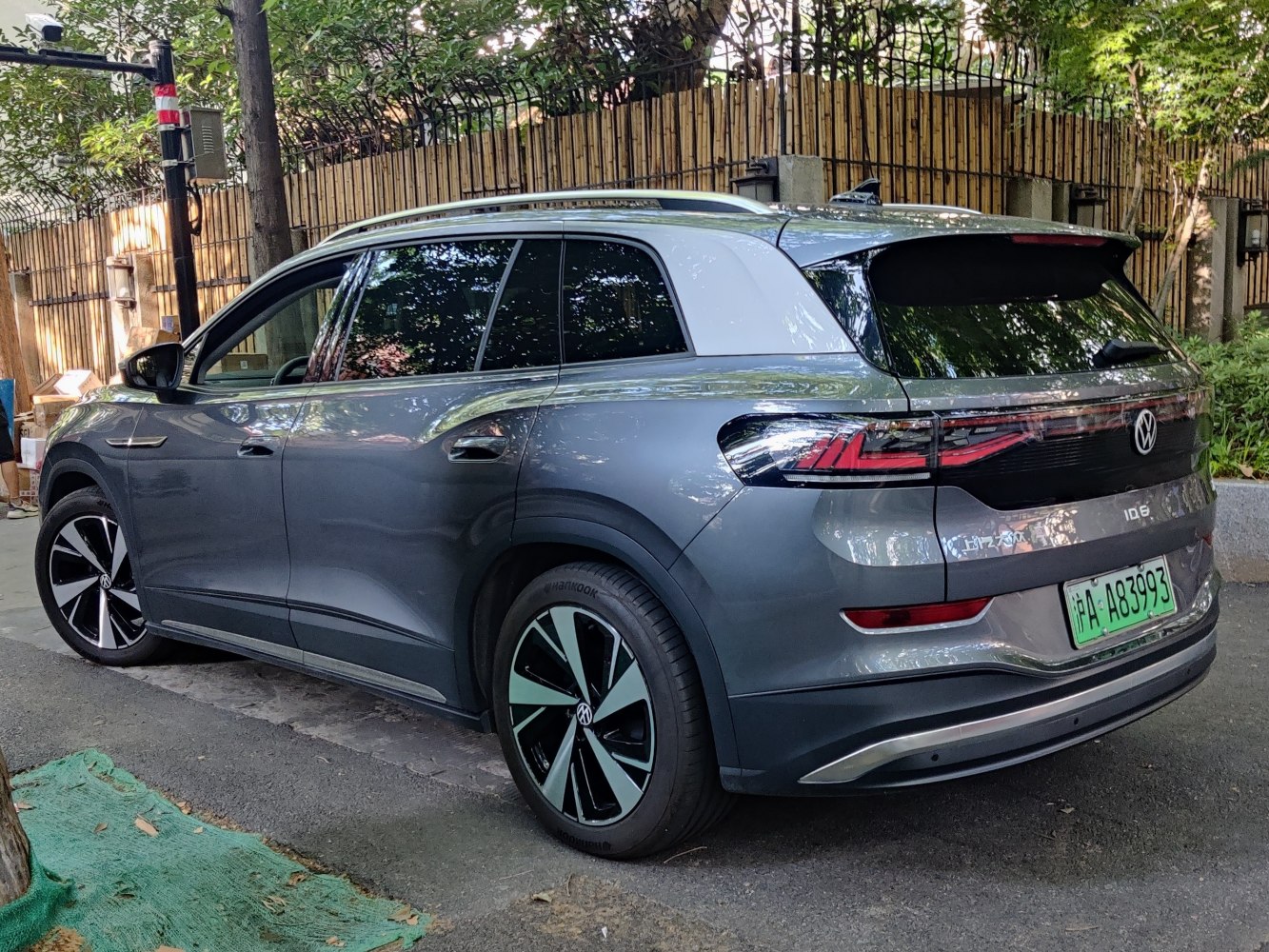 Rear and side view of a modern electric SUV with LED tail lights and sleek design.