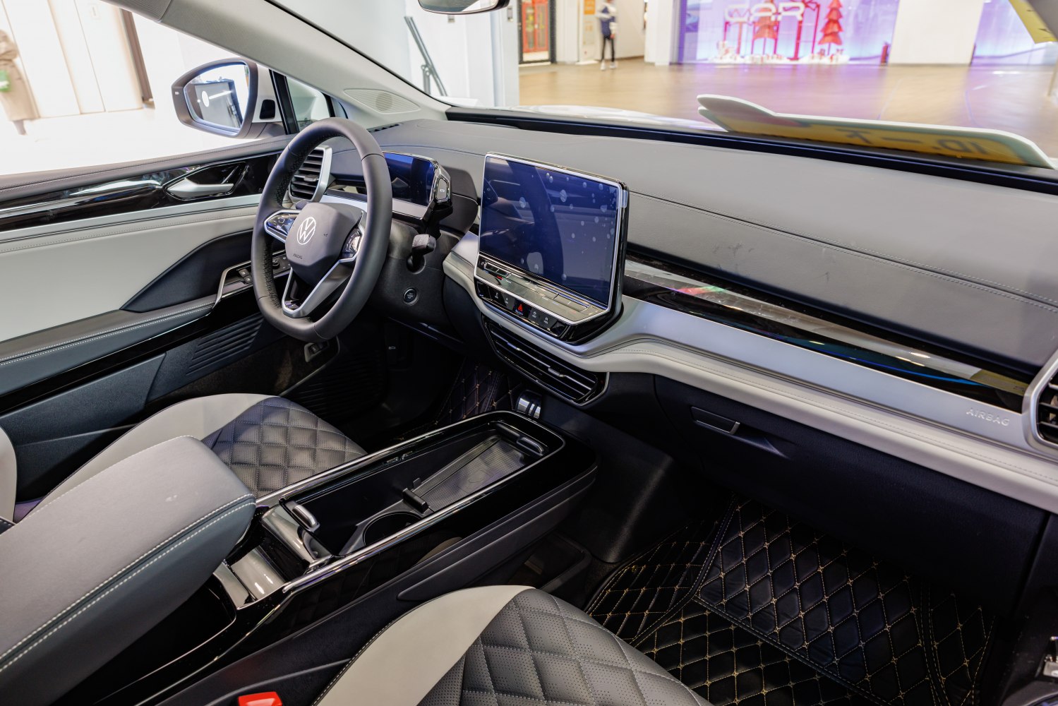 Interior showing digital dashboard and large infotainment touchscreen