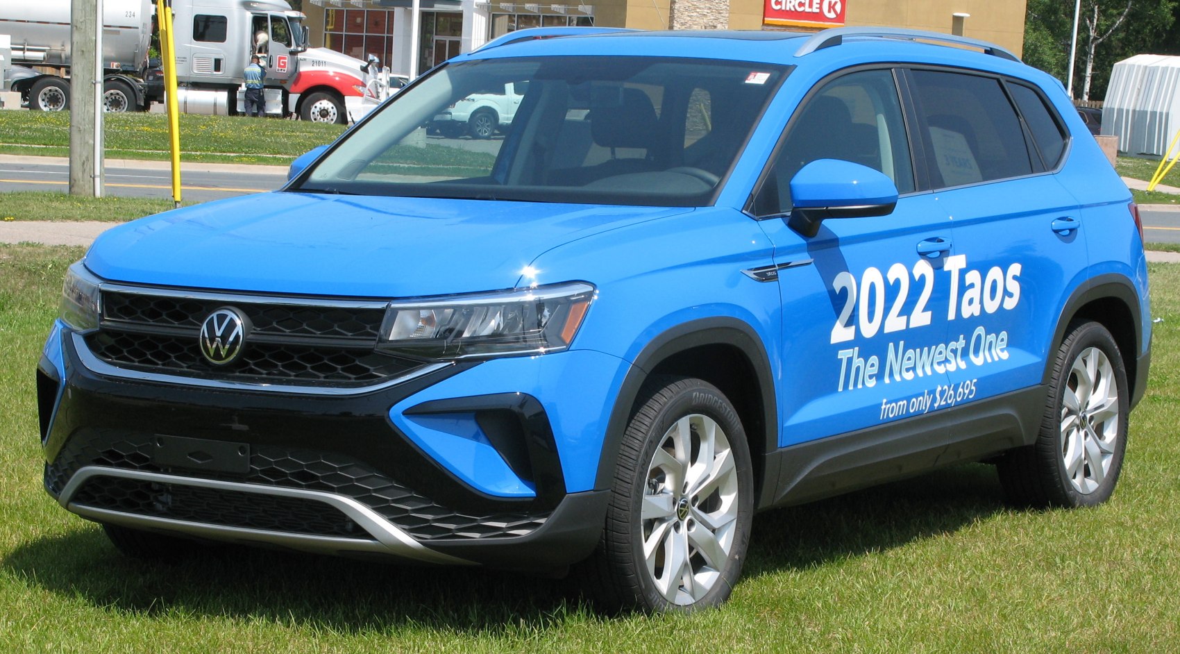 Blue compact SUV with distinctive grille and alloy wheels