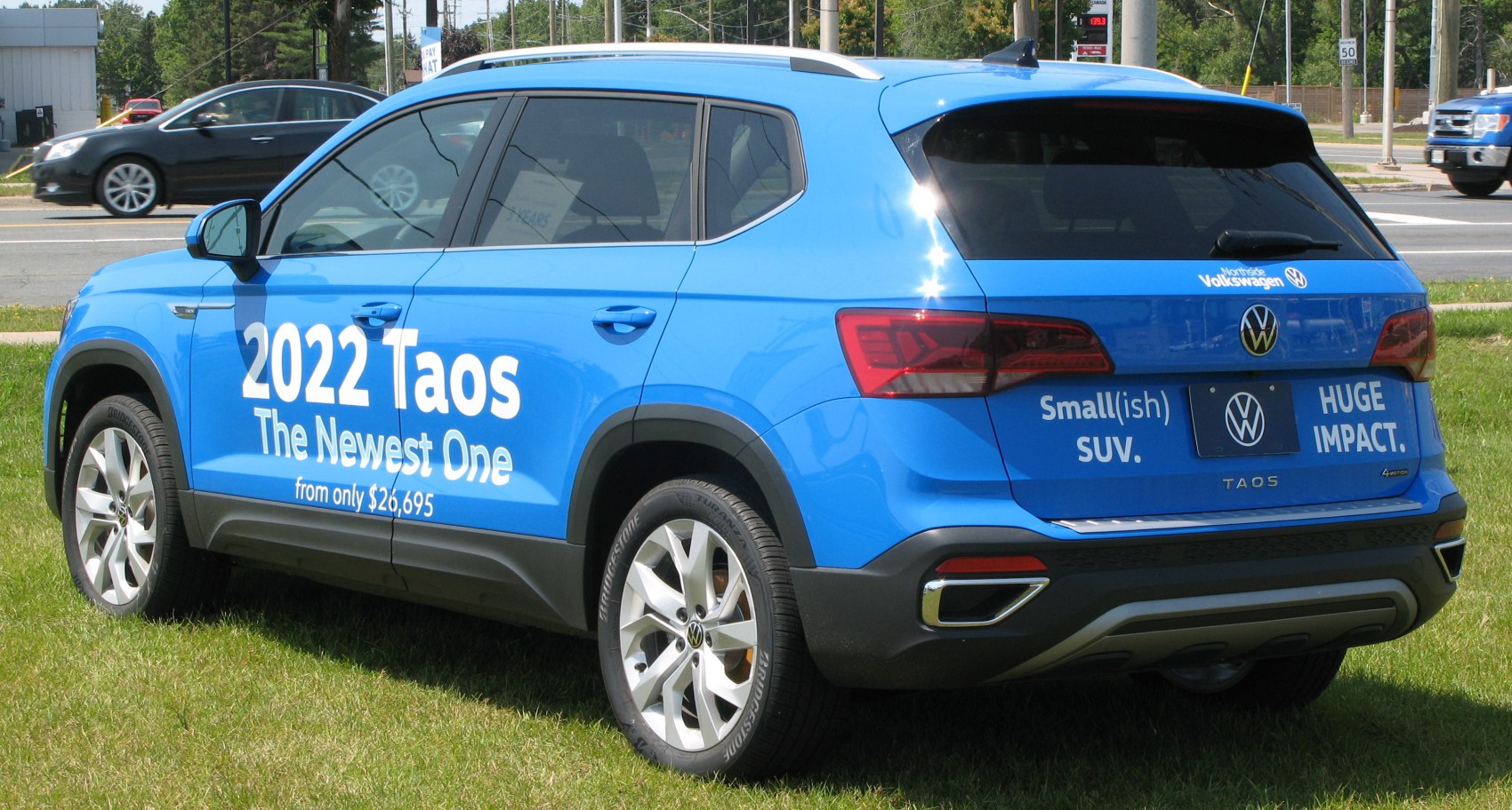 Compact SUV rear with striking taillights and silver alloy wheels