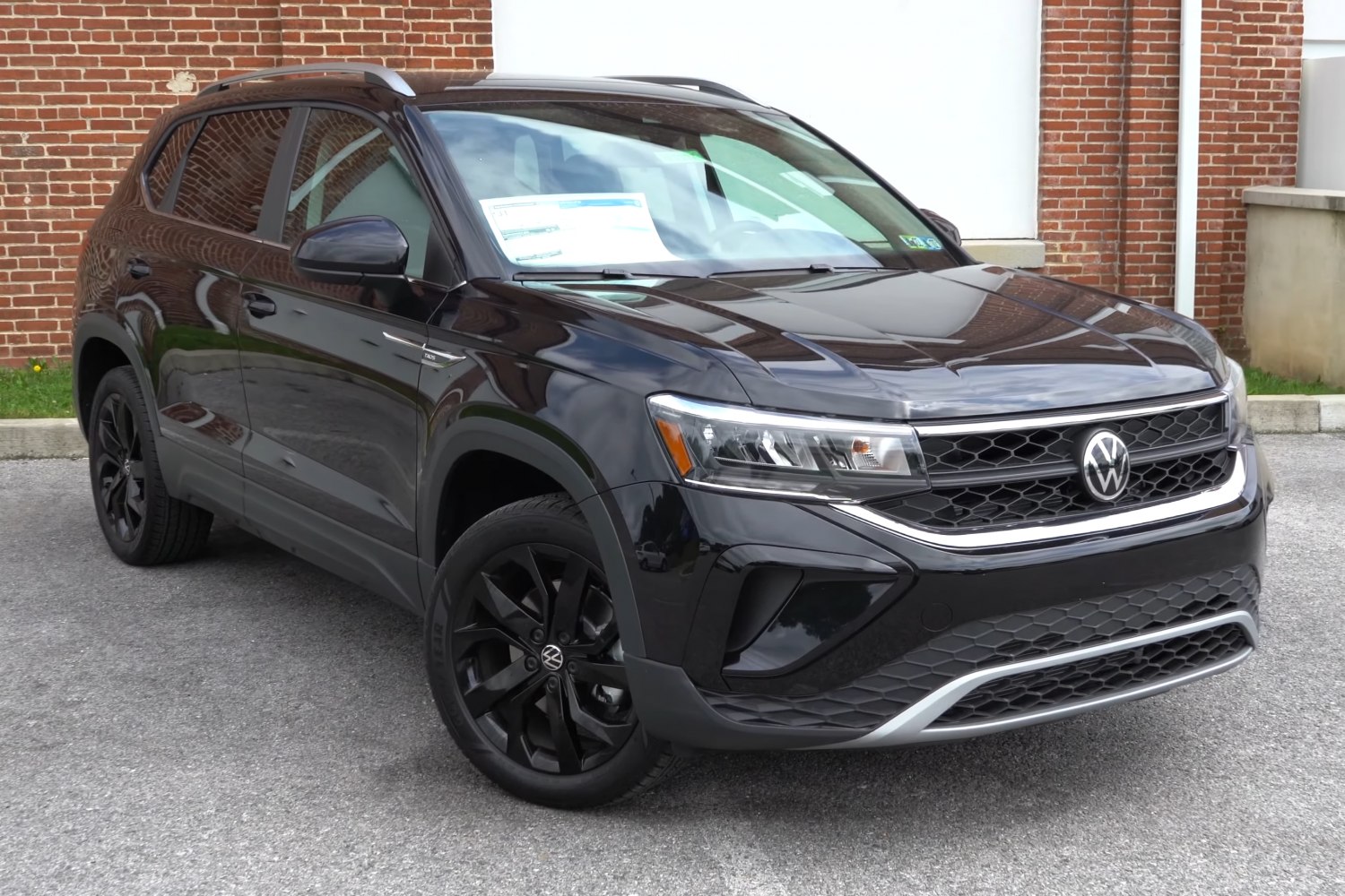 Front view with black alloy wheels and LED headlights