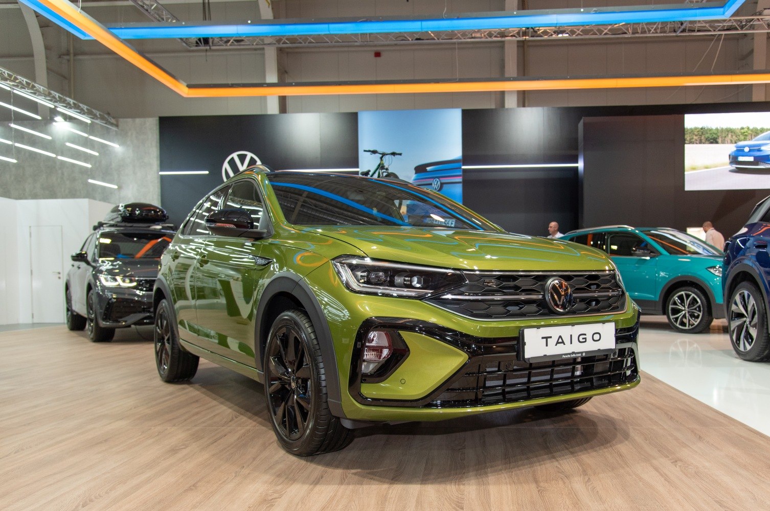 Green Volkswagen Taigo front view with black alloy wheels