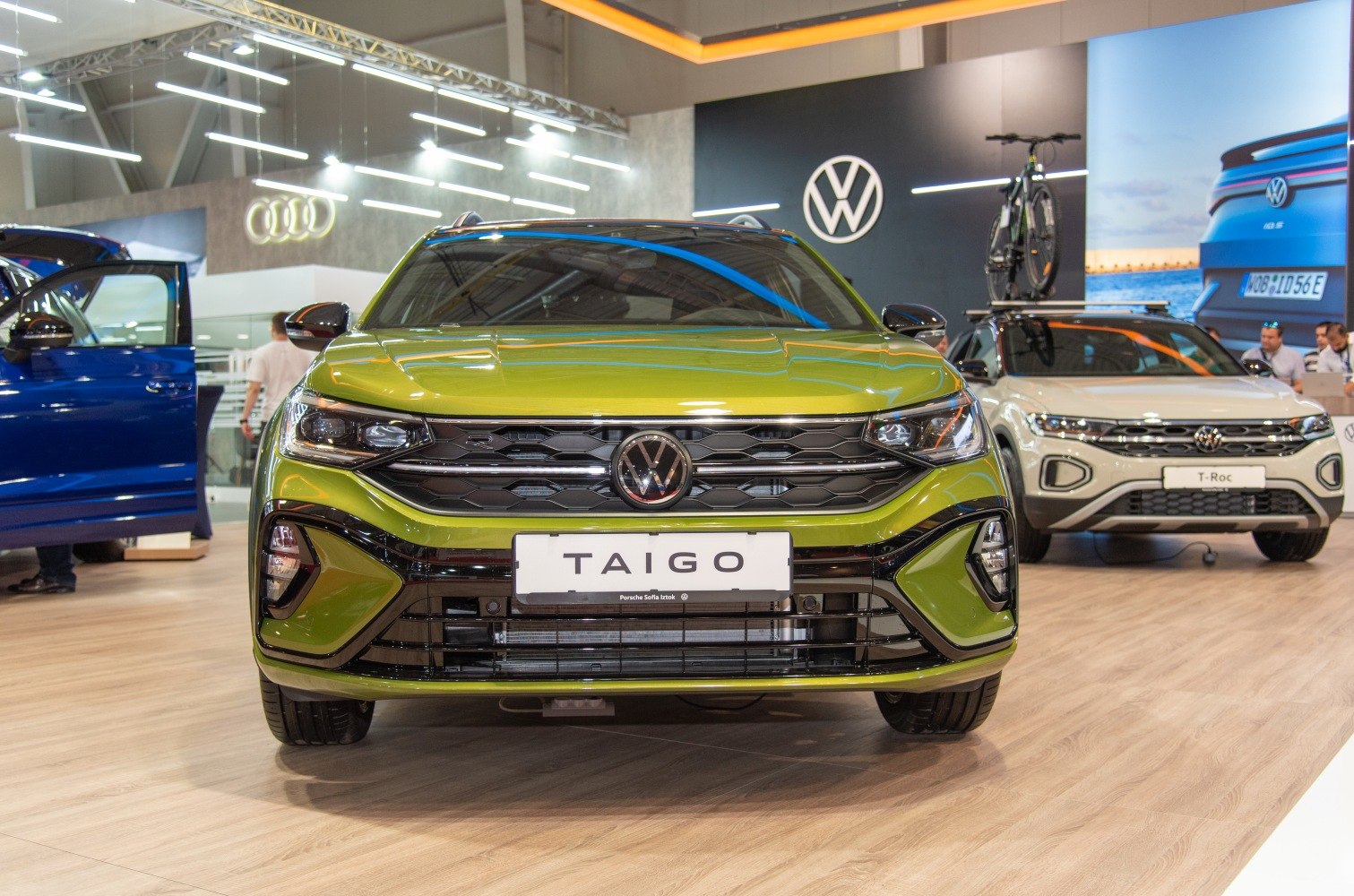 Frontal view with grille and headlights of modern compact SUV