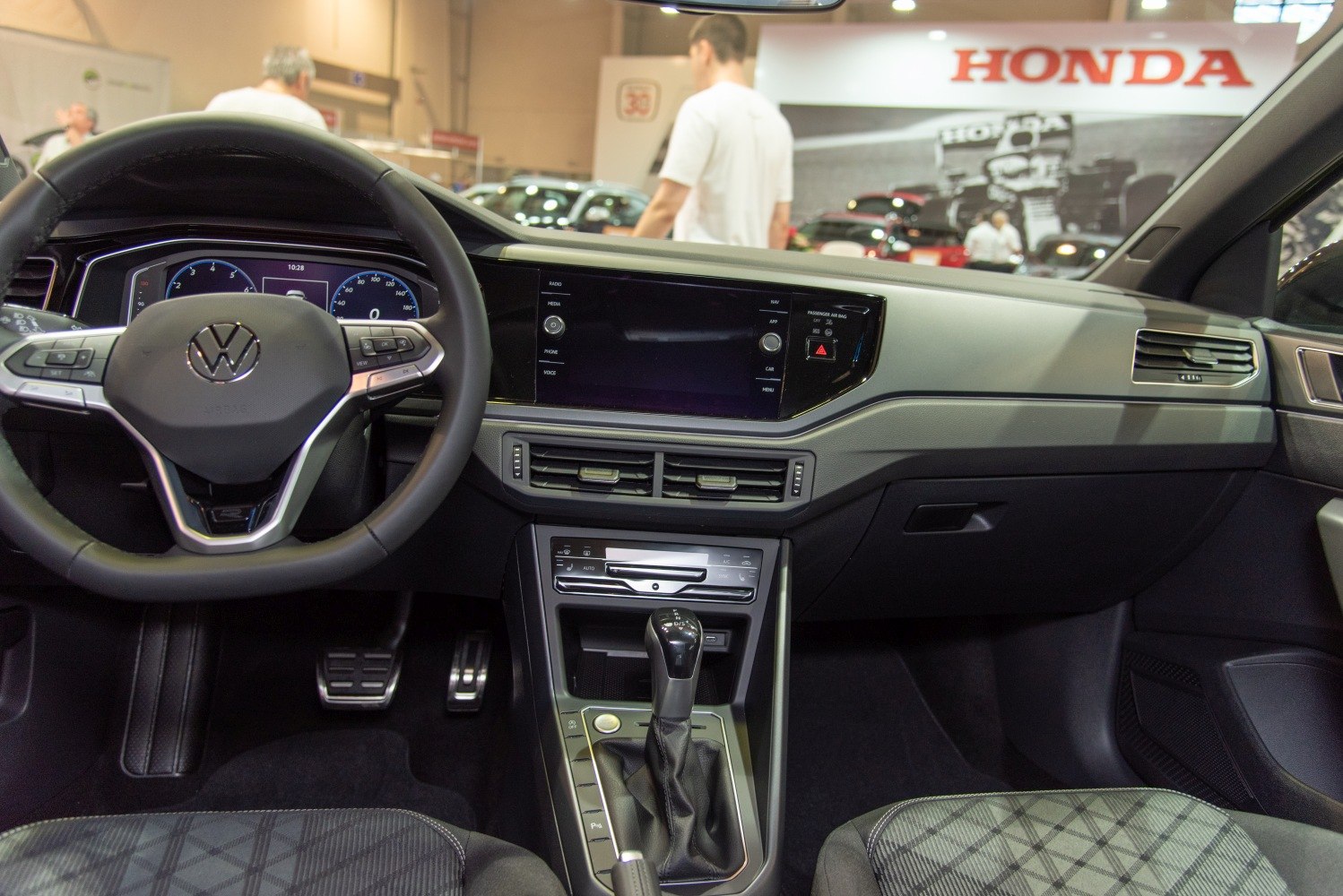 Modern car interior with digital dashboard and central touchscreen