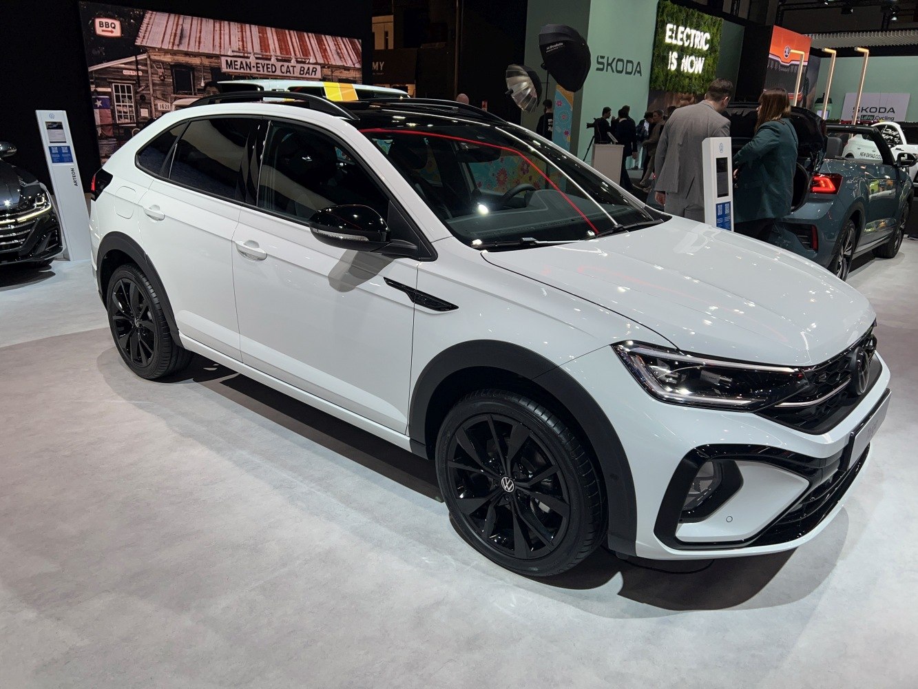 White compact SUV with black alloy wheels and LED headlights