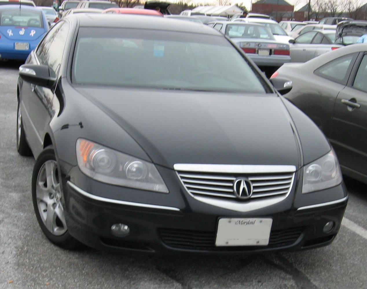 Front view of a luxury sedan with distinctive grille and headlights