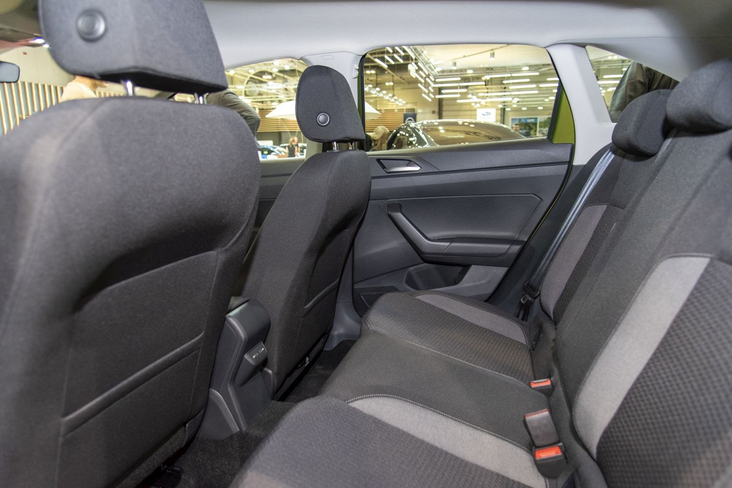 Spacious backseat interior with fabric upholstery and rear passenger space