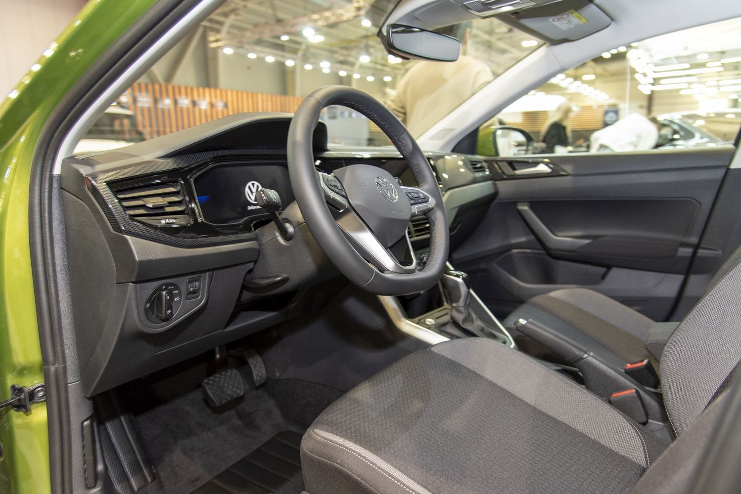 Interior dashboard and steering wheel with digital display and modern controls