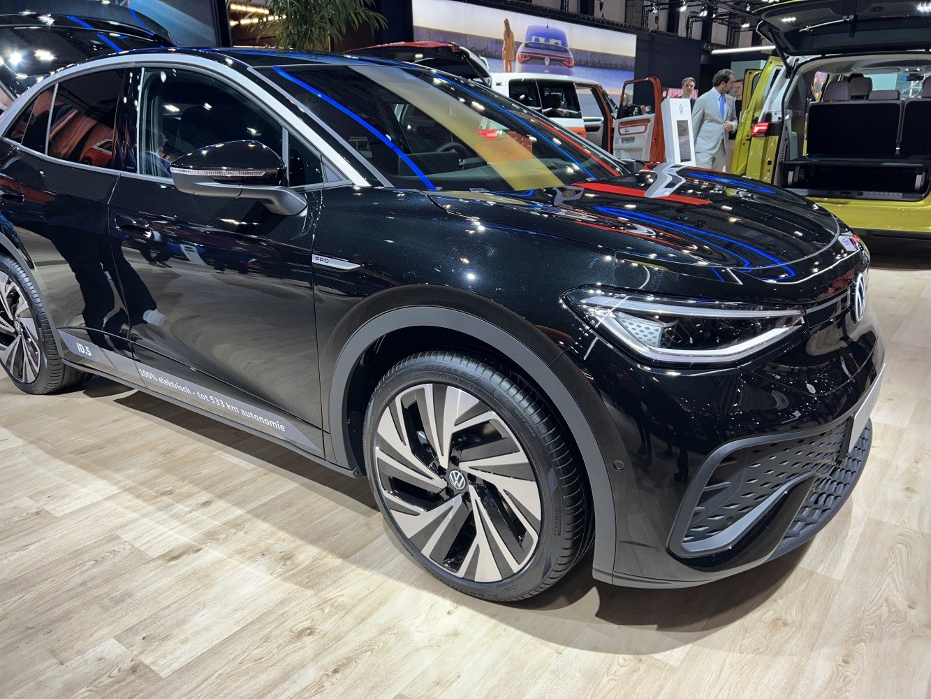 Sleek front and side aerodynamic design with LED headlights and modern wheels
