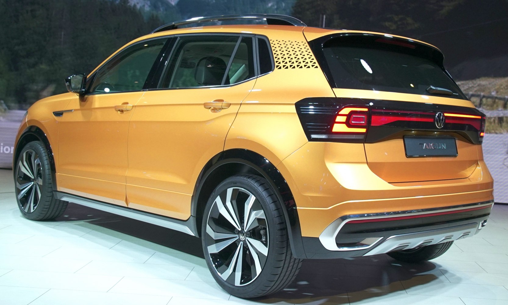 Rear side profile with LED taillights and alloy wheels
