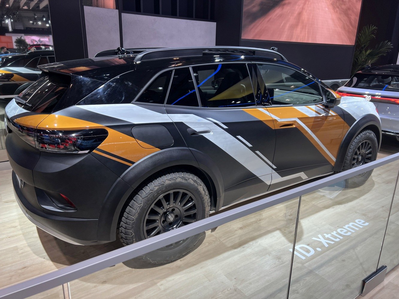 Concept SUV with geometric two-tone orange and black paint and rugged off-road tires