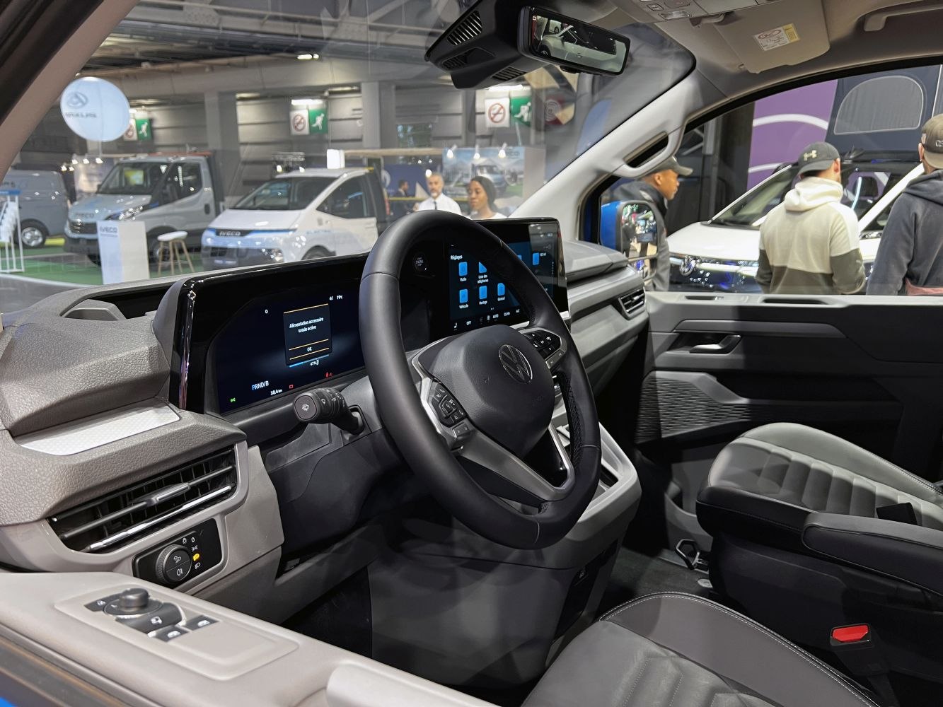 Modern dashboard with digital displays and multifunction steering wheel