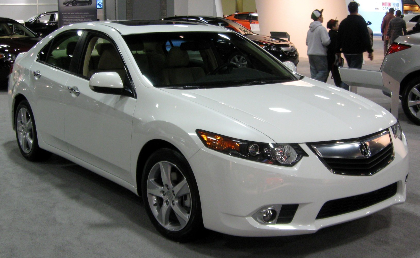 Front three-quarter view with headlights and alloy wheels