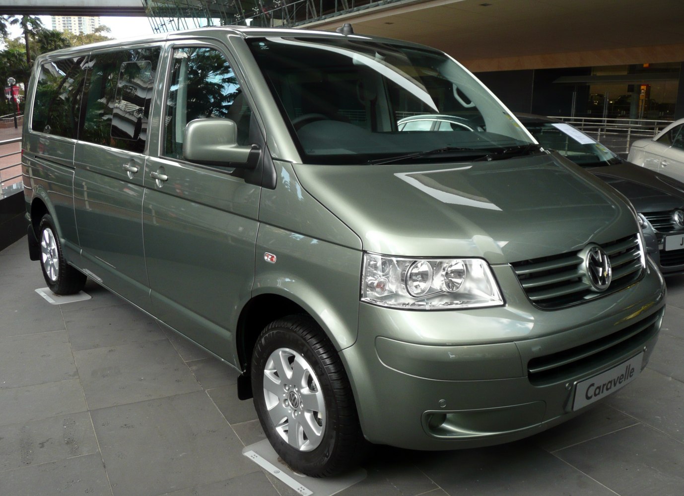 Front side view with distinct headlights and multiple windows