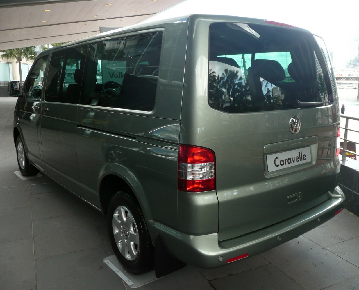 Extended body minivan rear and side views with large windows and rear tail lights
