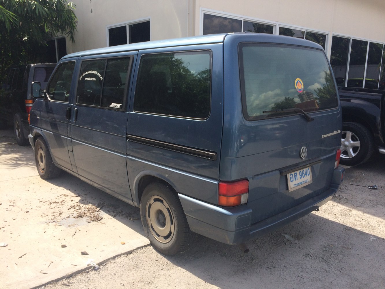 Boxy van with sliding side door and rear large window