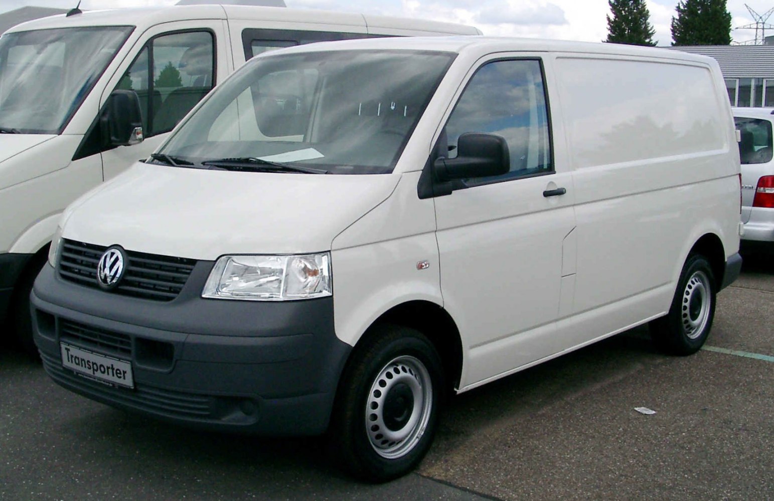White panel van with black bumpers and steel wheels