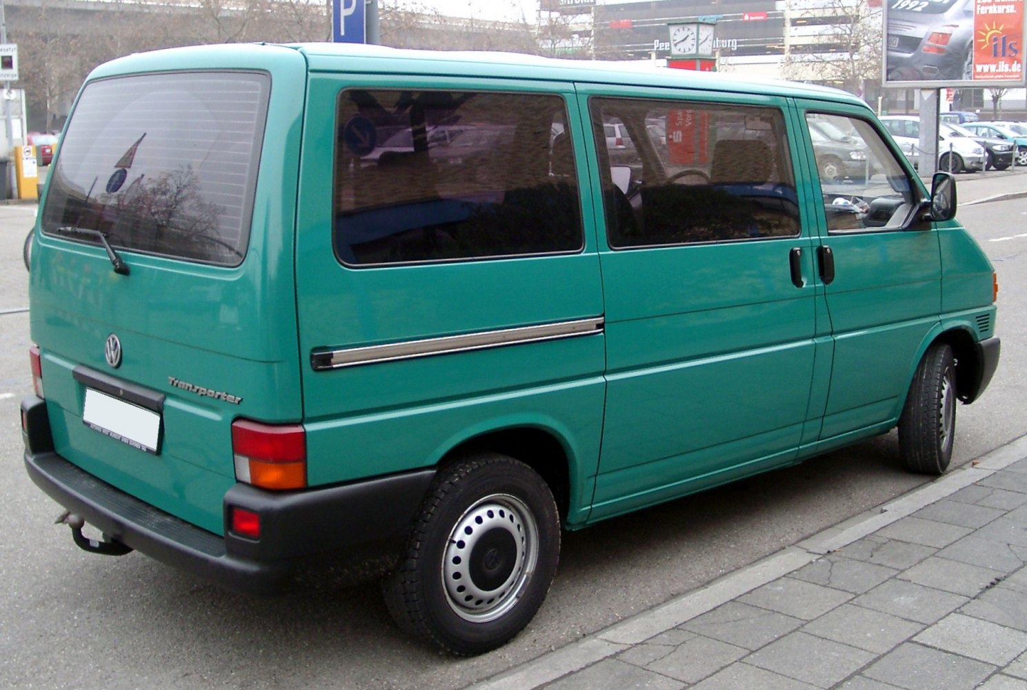 Van rear side view with sliding door and tinted windows
