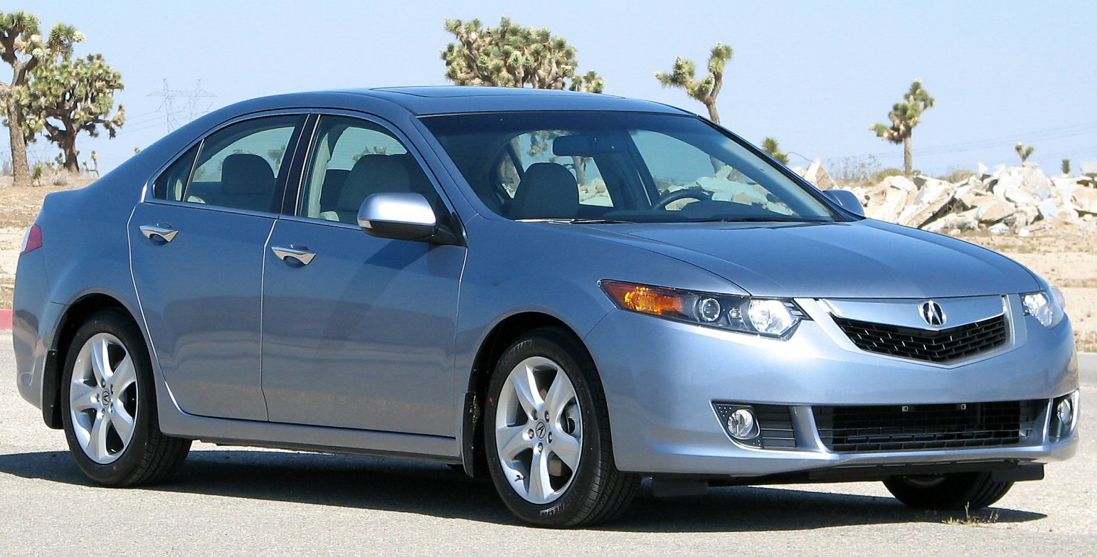Sleek sedan with alloy wheels and front fog lamps