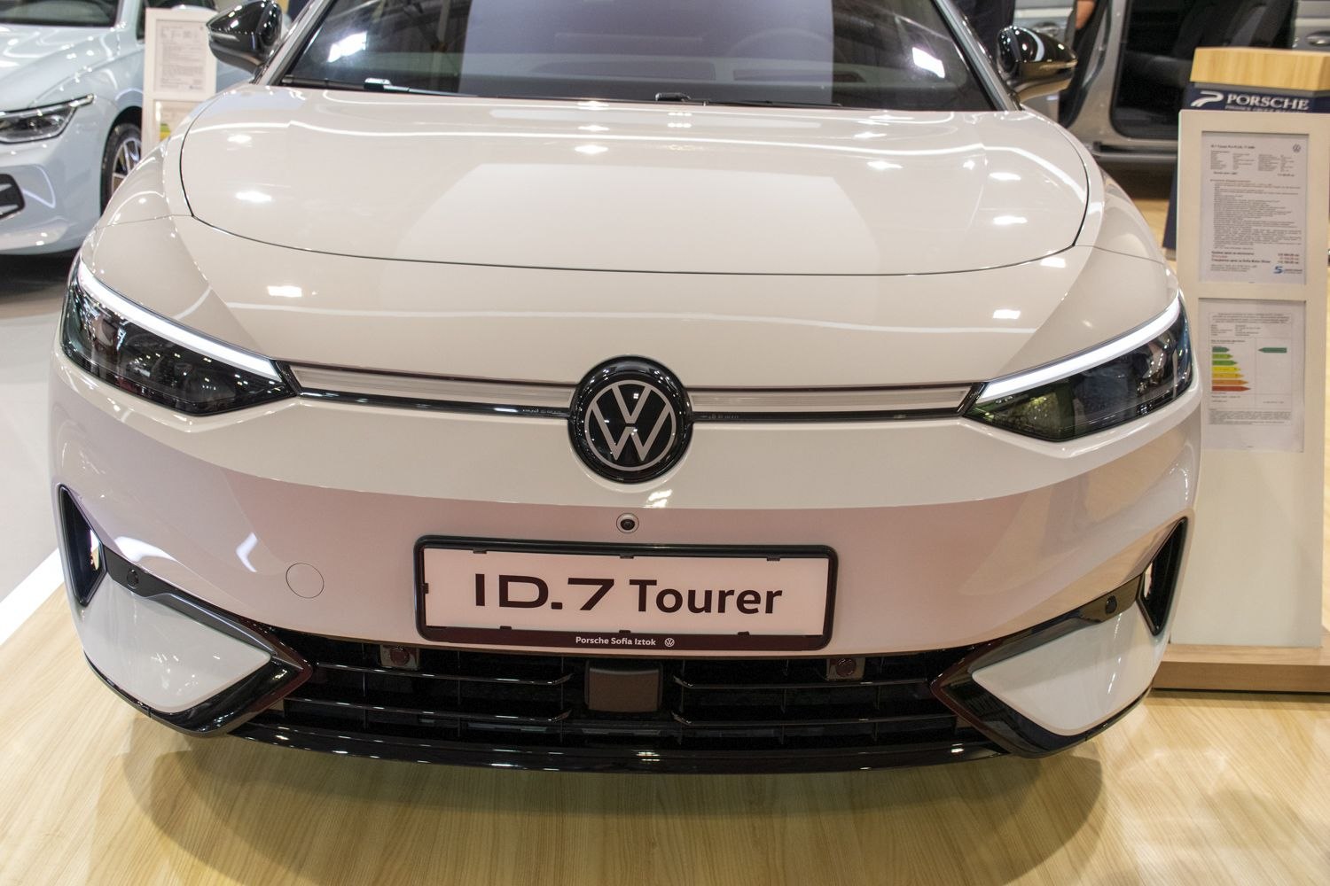 Front view with sleek headlights and modern grille