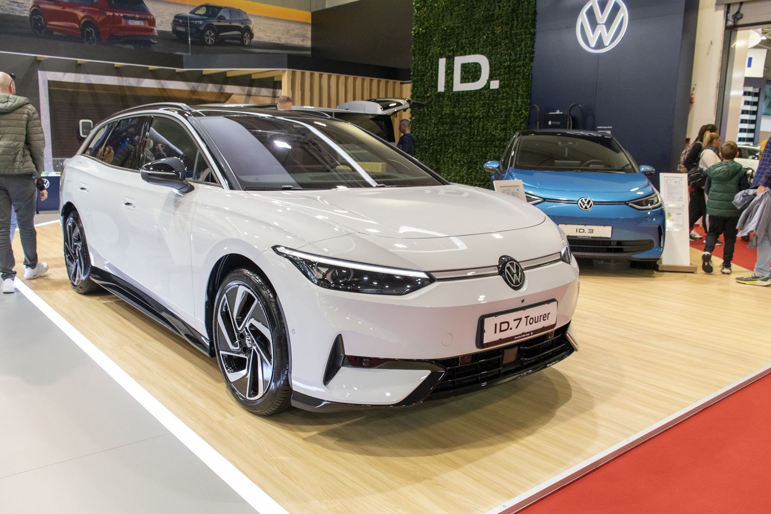 Front and side view of modern vehicle with LED headlights and aerodynamic shape