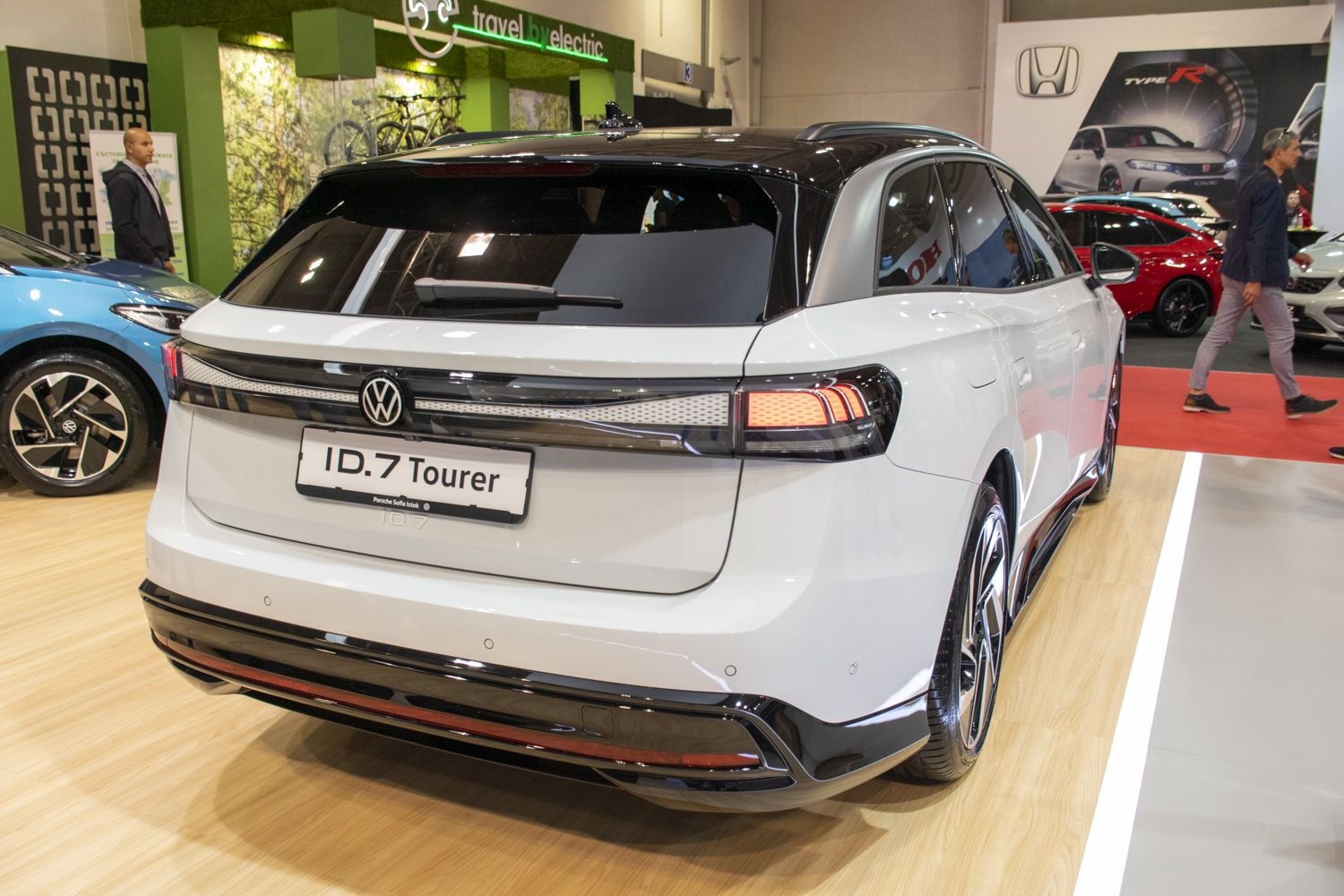 Electric SUV rear with LED tail lights and black roof contrast