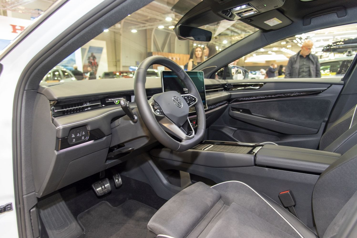 Modern digital dashboard and steering wheel in a vehicle interior