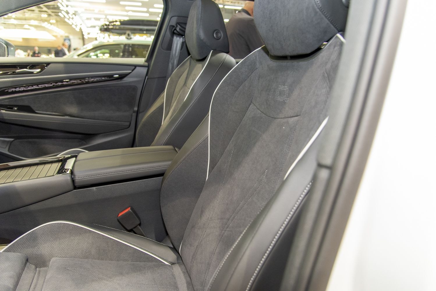 Front interior seats and door panel with premium materials