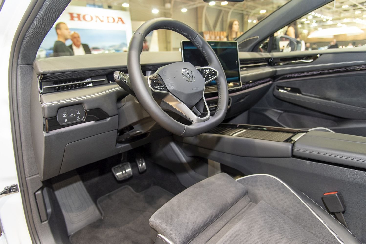 Digital dashboard and multifunction steering wheel in sleek modern interior