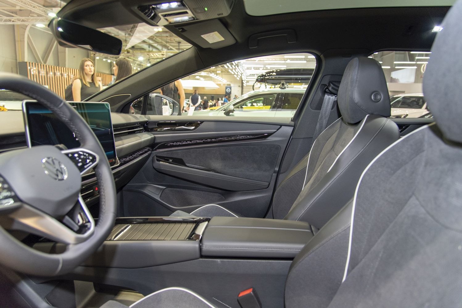 Modern car interior with digital dashboard and ergonomic front seats