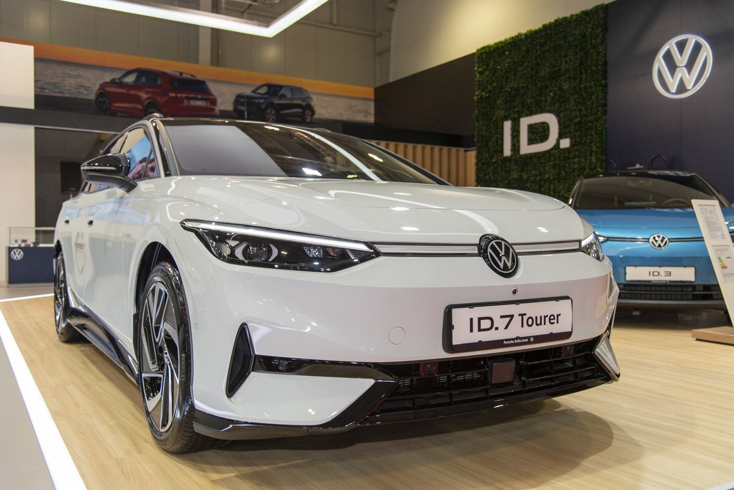 Front view with sleek headlights and aerodynamic design of an electric vehicle