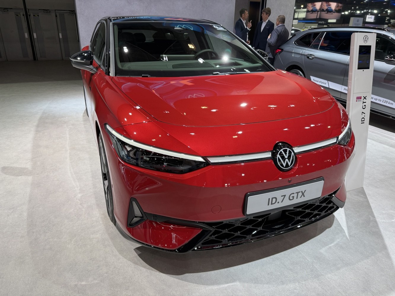 Modern LED headlights and bold red front hood design