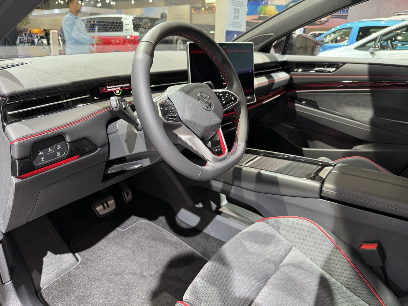 Digital dashboard and steering wheel with modern controls and GTX trim