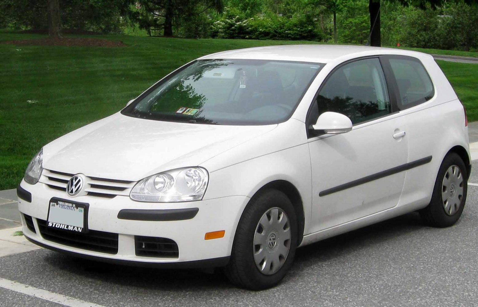 White 3-door hatchback front and side view