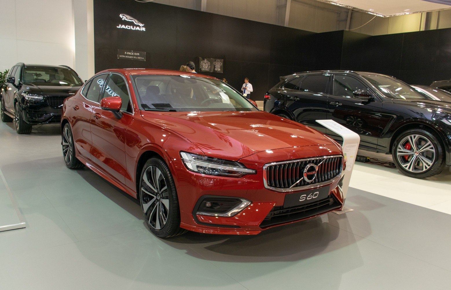 Red sedan with LED headlights and sporty alloy wheels