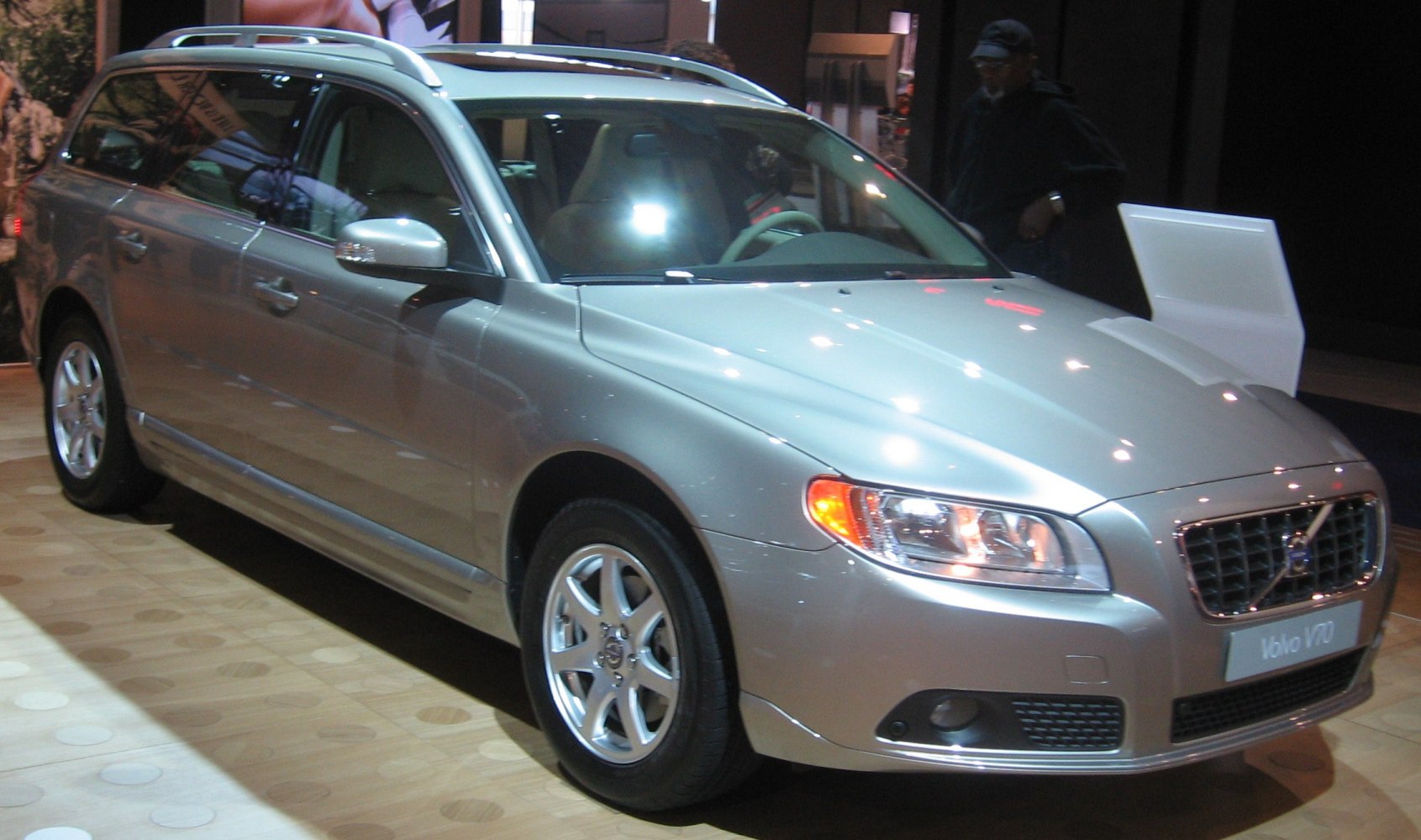 Silver station wagon with alloy wheels and roof rails