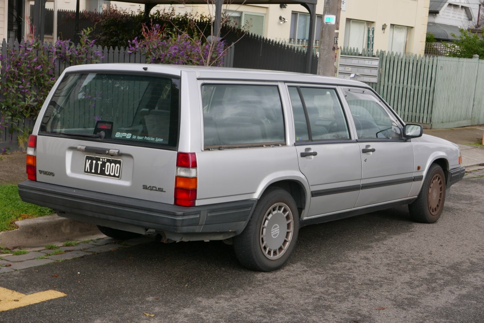 Rear and side view of a classic vintage station wagon.