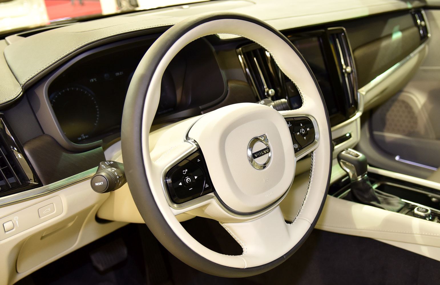 Modern steering wheel and digital dashboard with luxury interior styling