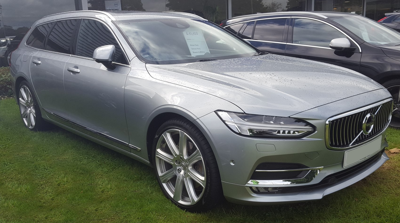 Silver luxury wagon with LED headlights and distinctive front grille
